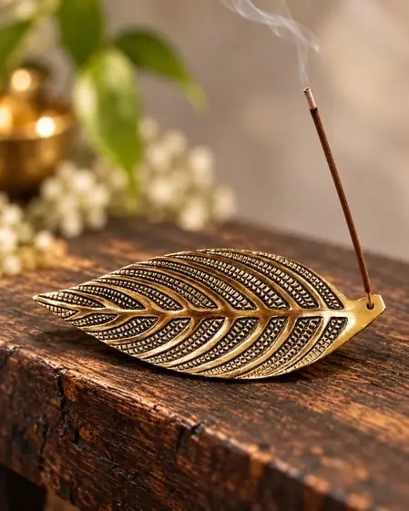 A brass leaf incense holder